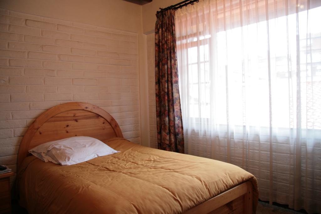 Apartamentos Los Quipus キト 部屋 写真
